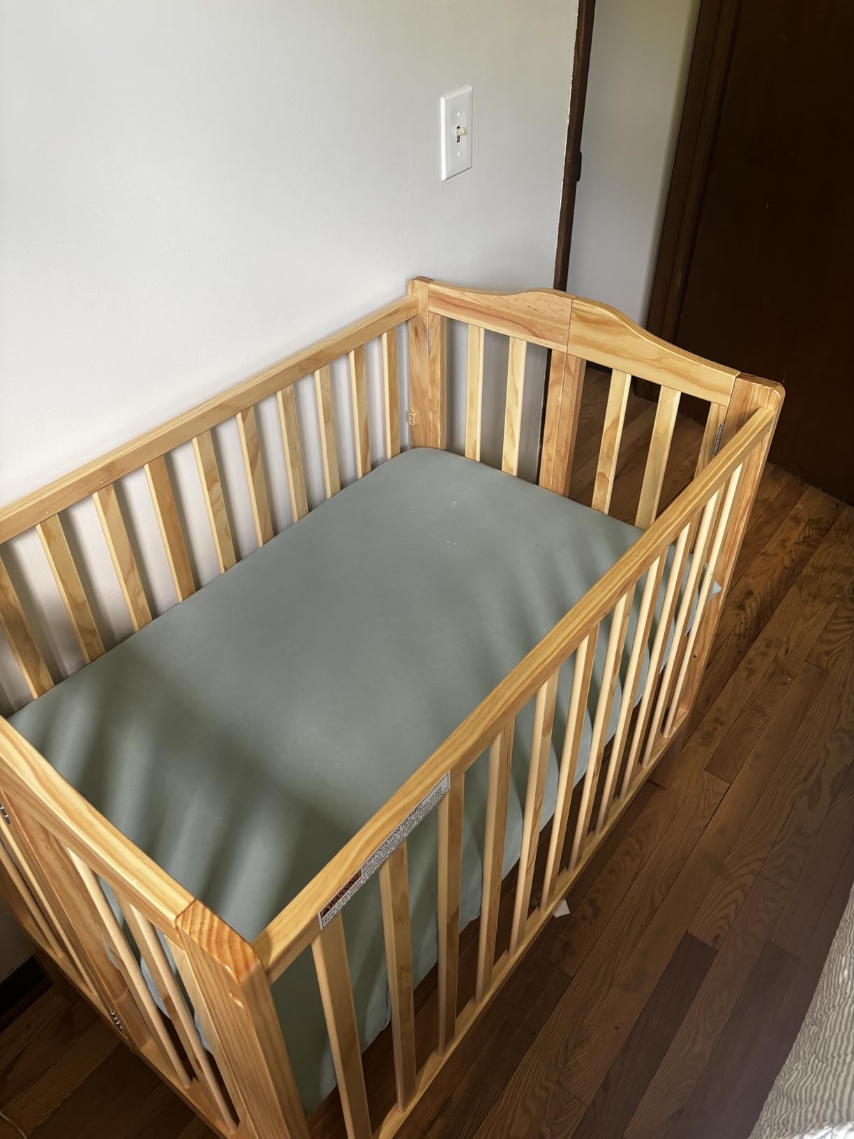 Delta Children Folding Portable Mini Baby Crib, Natural customer photo 1