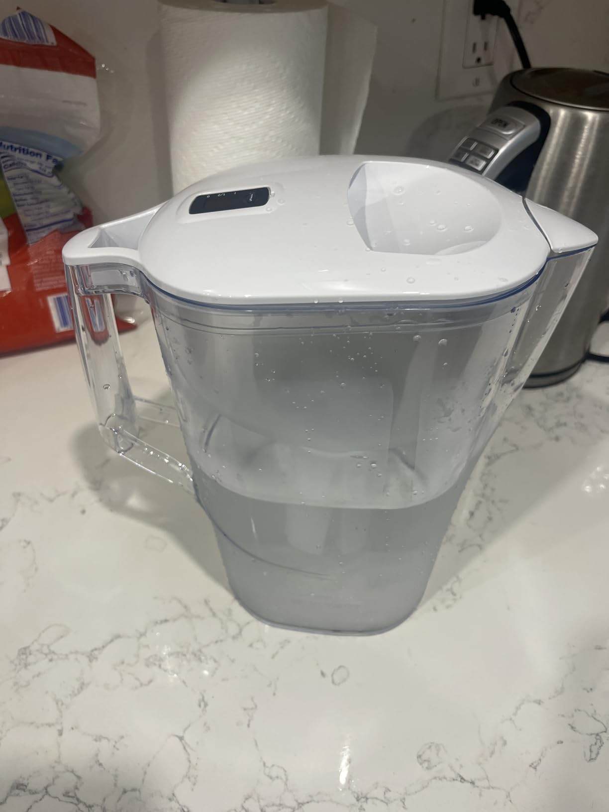 Amazon Basics 10-Cup Pitcher with Filter Compatible with Brita Water Filter Pitcher for Clean, Crisp Water, WQA and NSF Certified, Made in Europe customer photo 1