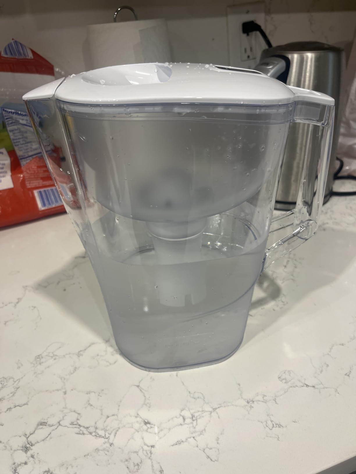 Amazon Basics 10-Cup Pitcher with Filter Compatible with Brita Water Filter Pitcher for Clean, Crisp Water, WQA and NSF Certified, Made in Europe customer photo 2
