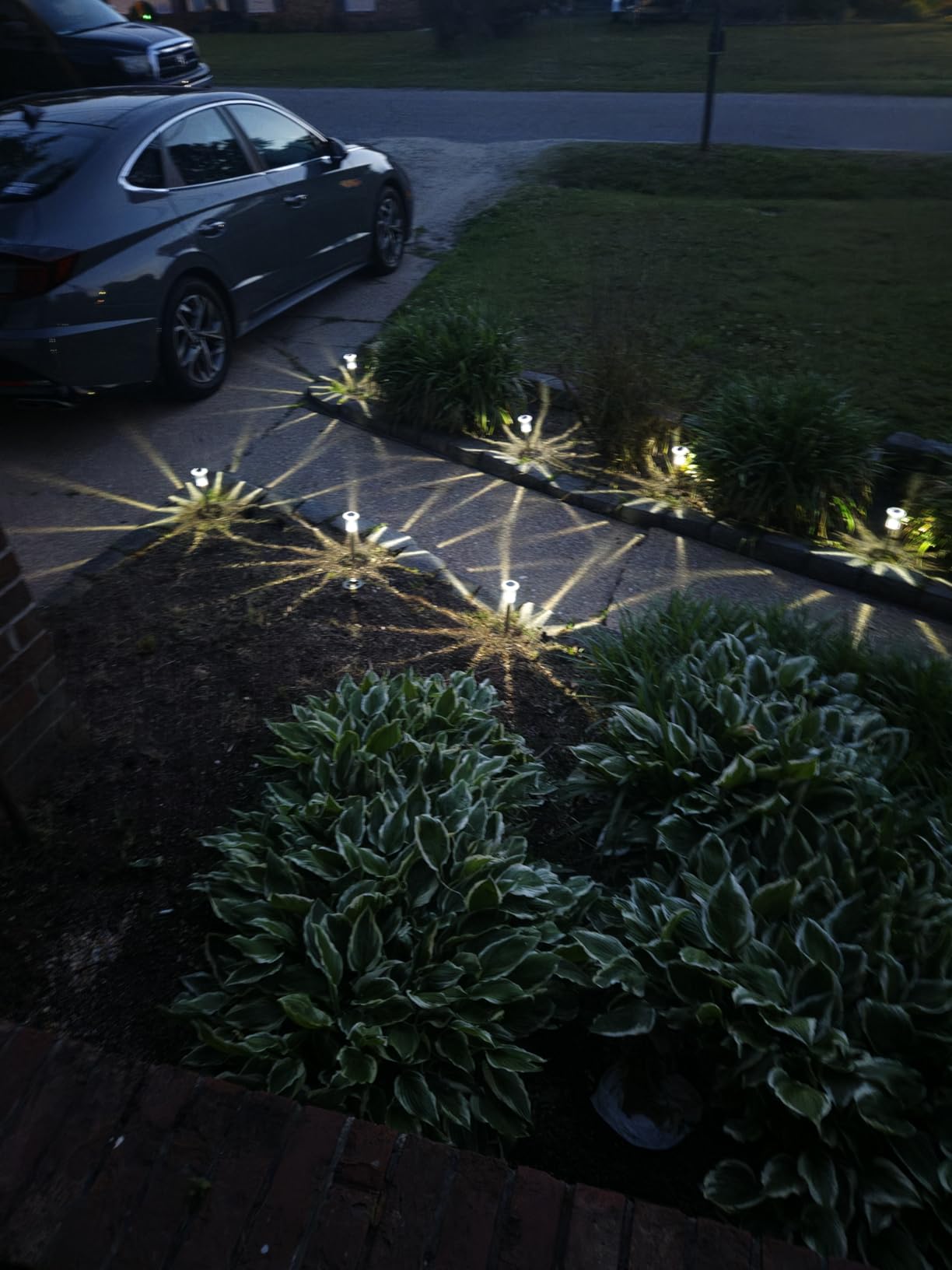 Eyrosa Solar Outdoor Lights, 10 Pack Waterproof Stainless Steel Solar Stake Lights for Pathway Garden Yard Path Walkway Driveway Lawn Patio Outside Decor, Cool White customer photo 2