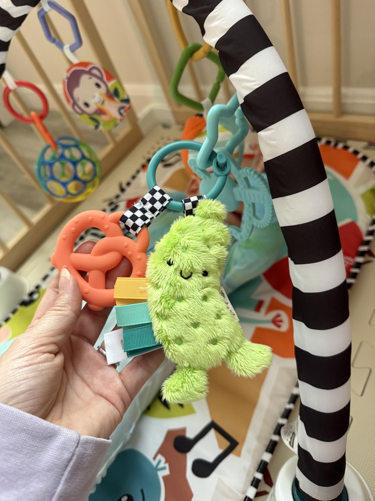 Itzy Ritzy Infant Toy & Teether - Itzy Pal Baby Teething Toy Includes Lovey, Crinkle Sound, Textured Ribbons & Silicone Teether Toy for Newborn (Mushroom) customer photo 1