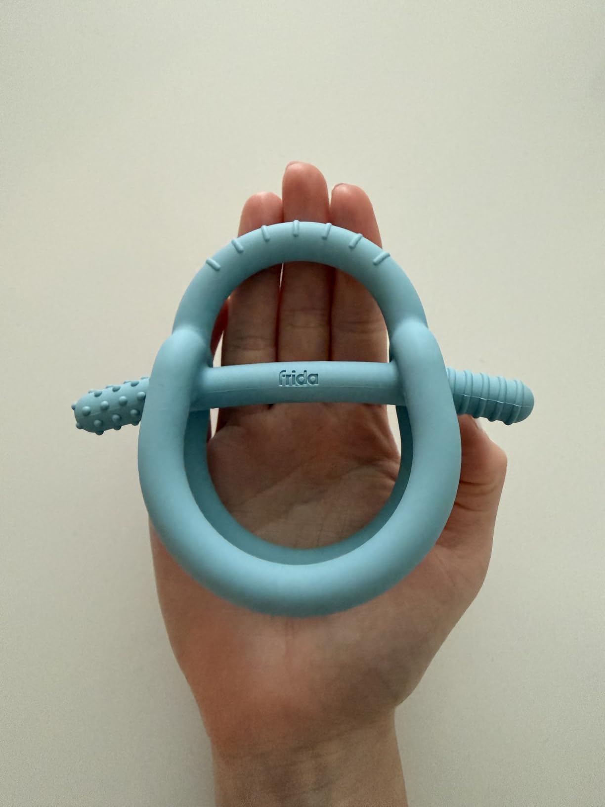 Frida Baby Get-A-Grip BabyTeether for Teething Relief | 100% Food-Grade Silicone Teething Toys for Baby 0-6, 12, 18 Months Infant, BPA-Free, PVC-Free | Blue customer photo 1