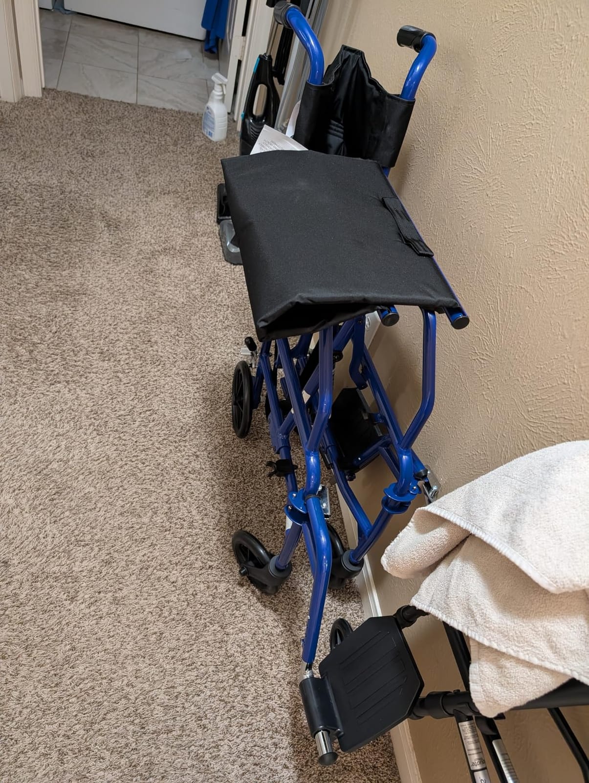 Medline Ultra Lightweight Transport Wheelchair for Adults, Foldable, 19-Inch Seat Width, Red Frame, Black Upholstery customer photo 1