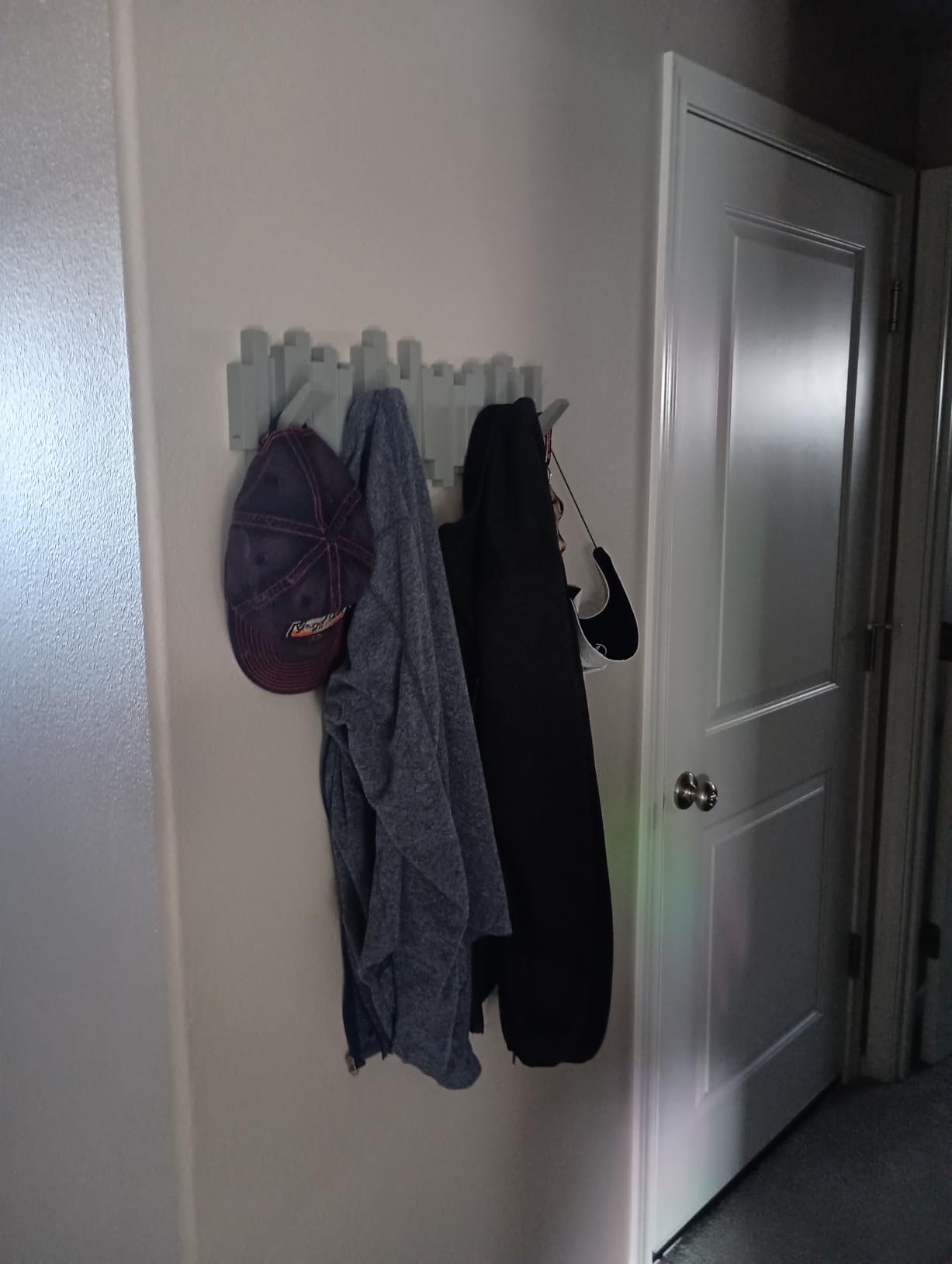 Umbra Sticks Wall Mount Coat Rack, 5 Hook Retractable Pegs, Black customer photo 2
