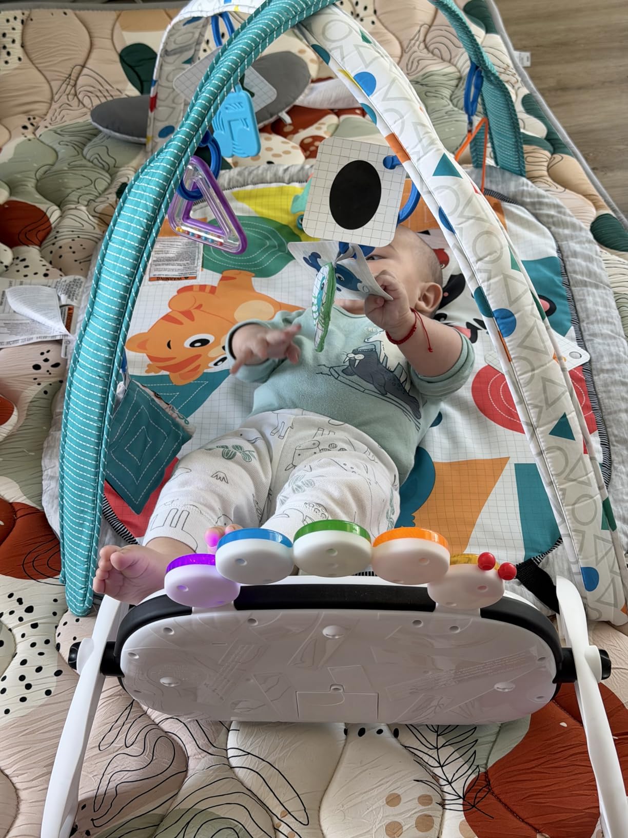 Baby Einstein 4-in-1 Kickin' Tunes Music and Language Play Gym and Piano Tummy Time Activity Mat customer photo 1