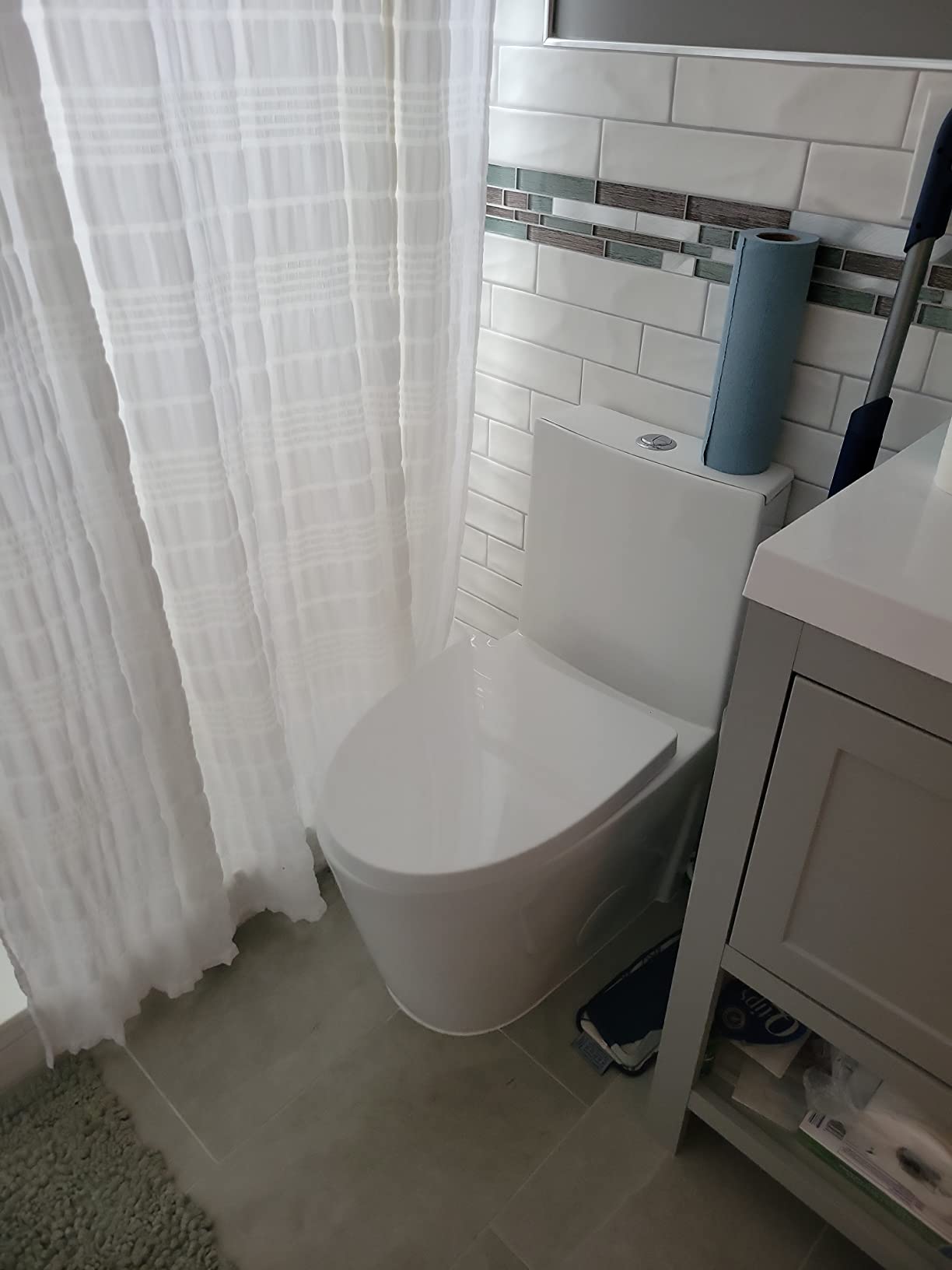 Fine Fixtures Dual-Flush Elongated One Piece Toilet Bowl - Soft Close Seat with Dual Flush in White customer photo 2