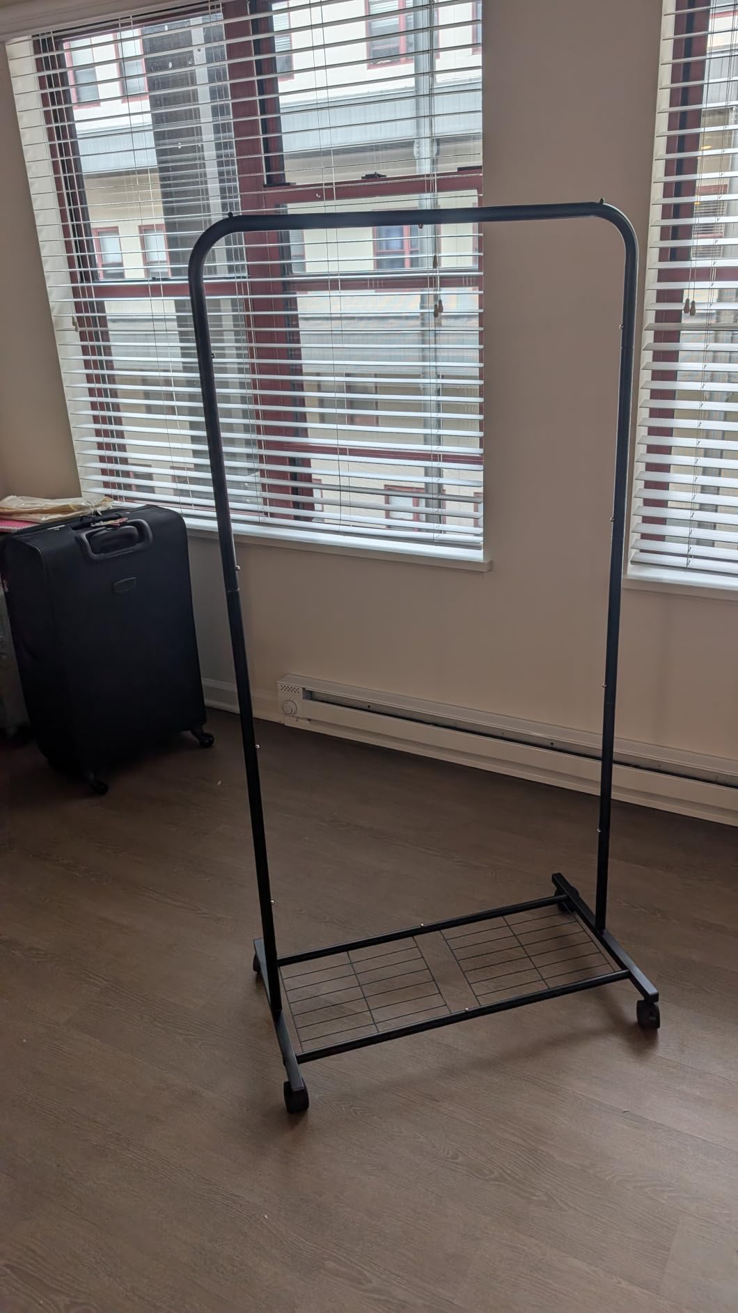 Sakugi Clothes Rack - Clothing Rack with Storage Mesh Shelf & Casters, Heavy-Duty Metal Clothing Rack for Hanging Clothes, Dresses, Coats, Large Load Capacity, Easy Assembly, Black, 28.0x16.9x59.0 customer photo 2