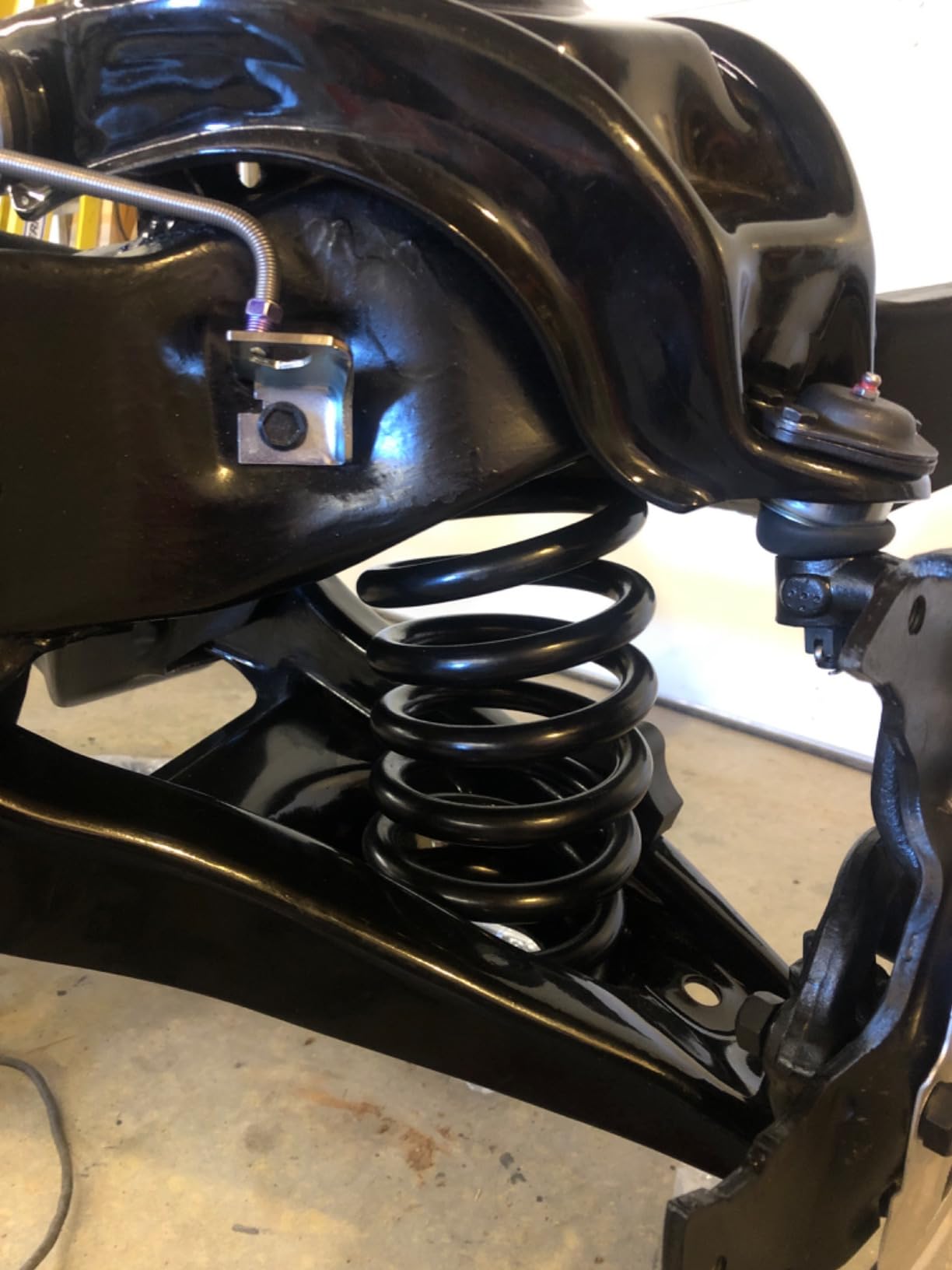 OTC 7045B Front Coil Spring Compressor - Compatible with Most Late-Model Rear Wheel Drive Domestic Vehicles with Coil Springs Between the Upper and Lower Control Arms, Black customer photo 2