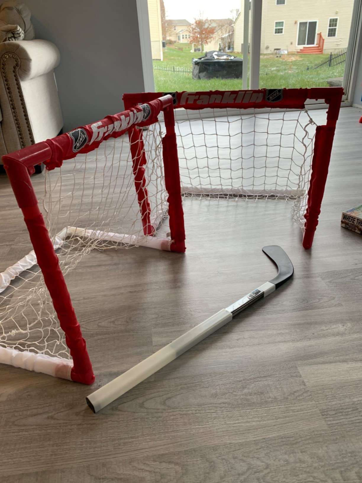 Franklin Sports - NHL Kids Folding Hockey Goals Set - (2) Street Hockey & Knee Hockey Goals - (2) Adjustable Youth Hockey Sticks, (2) Knee Hockey Sticks, (2) Mini Hockey Balls + (1) Street Hockey Ball customer photo 1