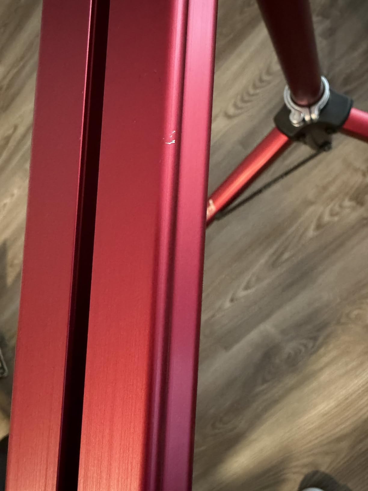Feedback Sports Sprint Bike Repair Stand, Compact Bike Workstand, Red | Dropout-style mount locks bikes securely; 360-degree platform rotates for full access during precise service customer photo 2