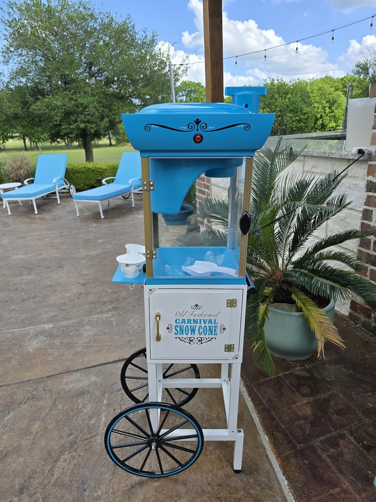 Nostalgia Snow Cone Shaved Ice Machine - Retro Cart Slushie Machine Makes 48 Icy Treats - Includes Metal Scoop, Storage Compartment, Wheels for Easy Mobility - White, Blue customer photo 1