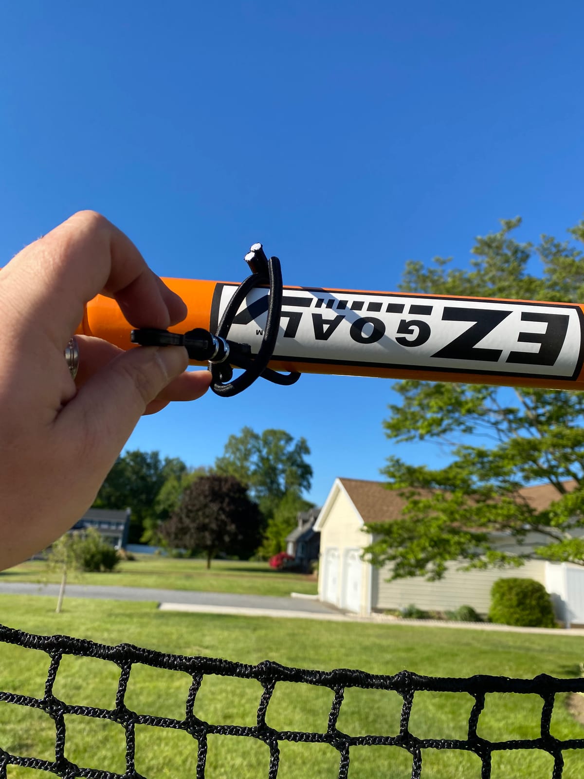 EZGoal 2” Professional folding 6' x 6' lacrosse Metal Goal with a Pro LAX Rocket Throwback Rebounder Trainer to Practice Your Passes and Catches, Orange, 6 x 6-Feet (87615) customer photo 2