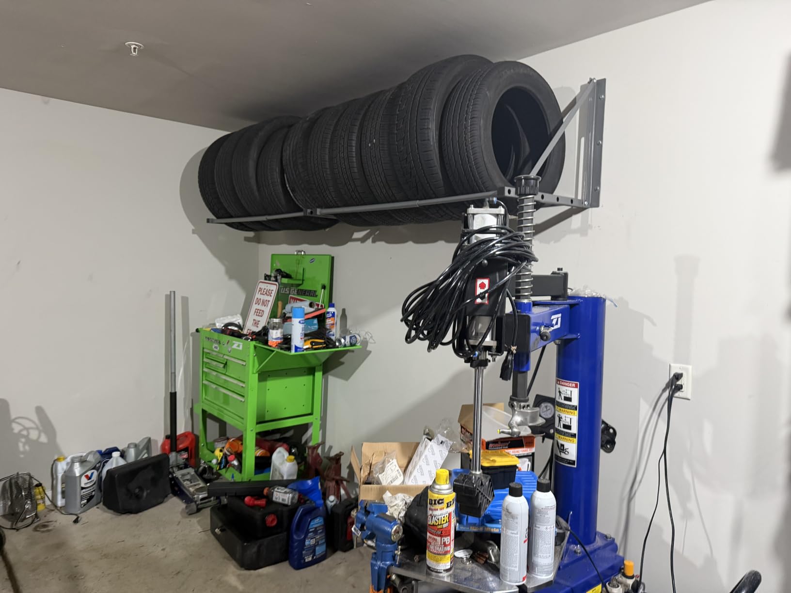 MaxxHaul Adjustable Wall Mount Folding Tire Rack – 32 to 48 Inch Width – 300 lb Capacity – Heavy Duty Steel Garage Tire Storage Holds 4 Tires – 70489 customer photo 1