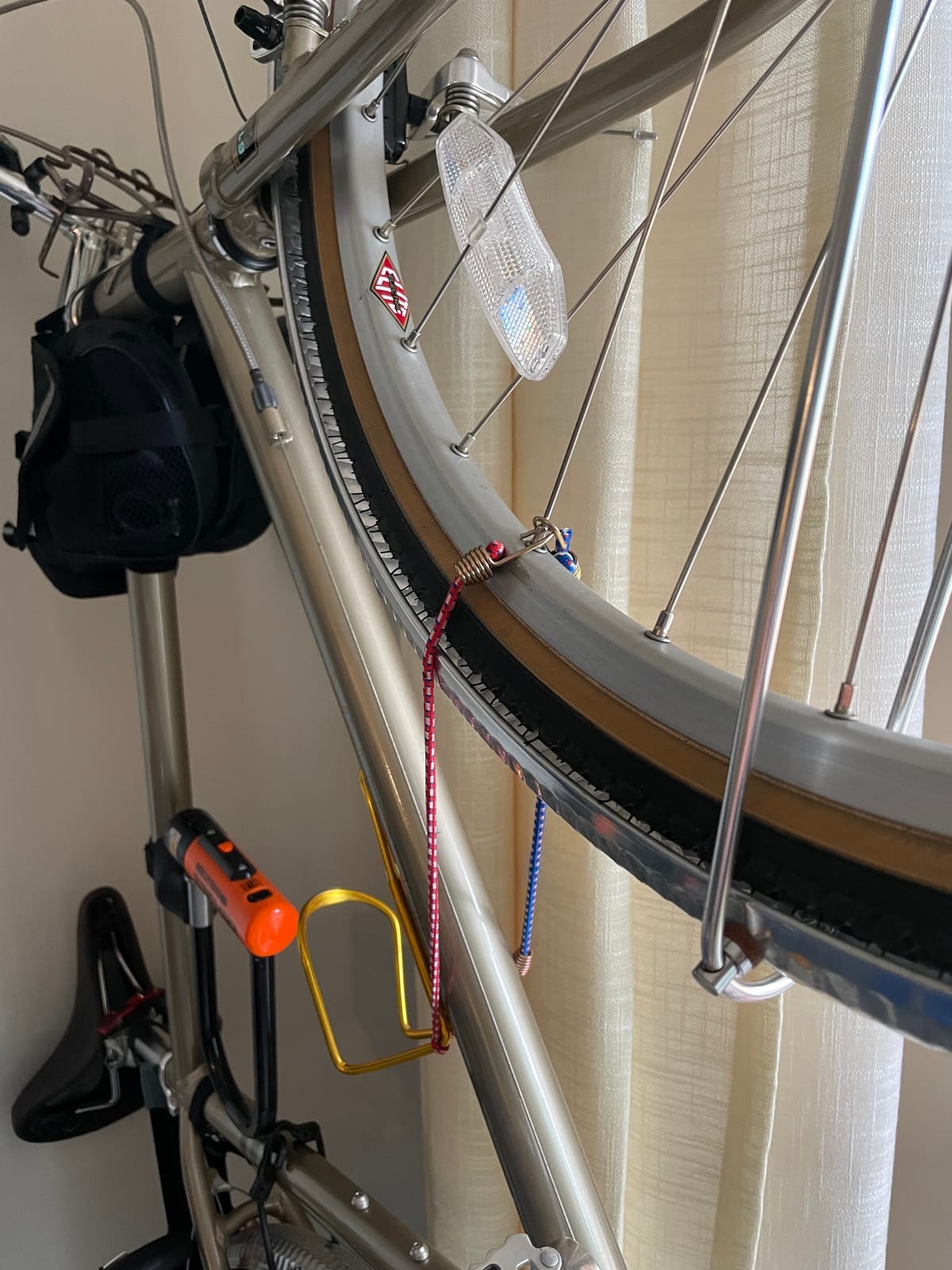 Bike Nook Bike Stand & Vertical Storage Rack - The Original Vertical Bicycle Floor Stand for Garage Storage, Indoor and Outdoor - Perfect Bike Accessories for Small Spaces with No Drilling customer photo 1