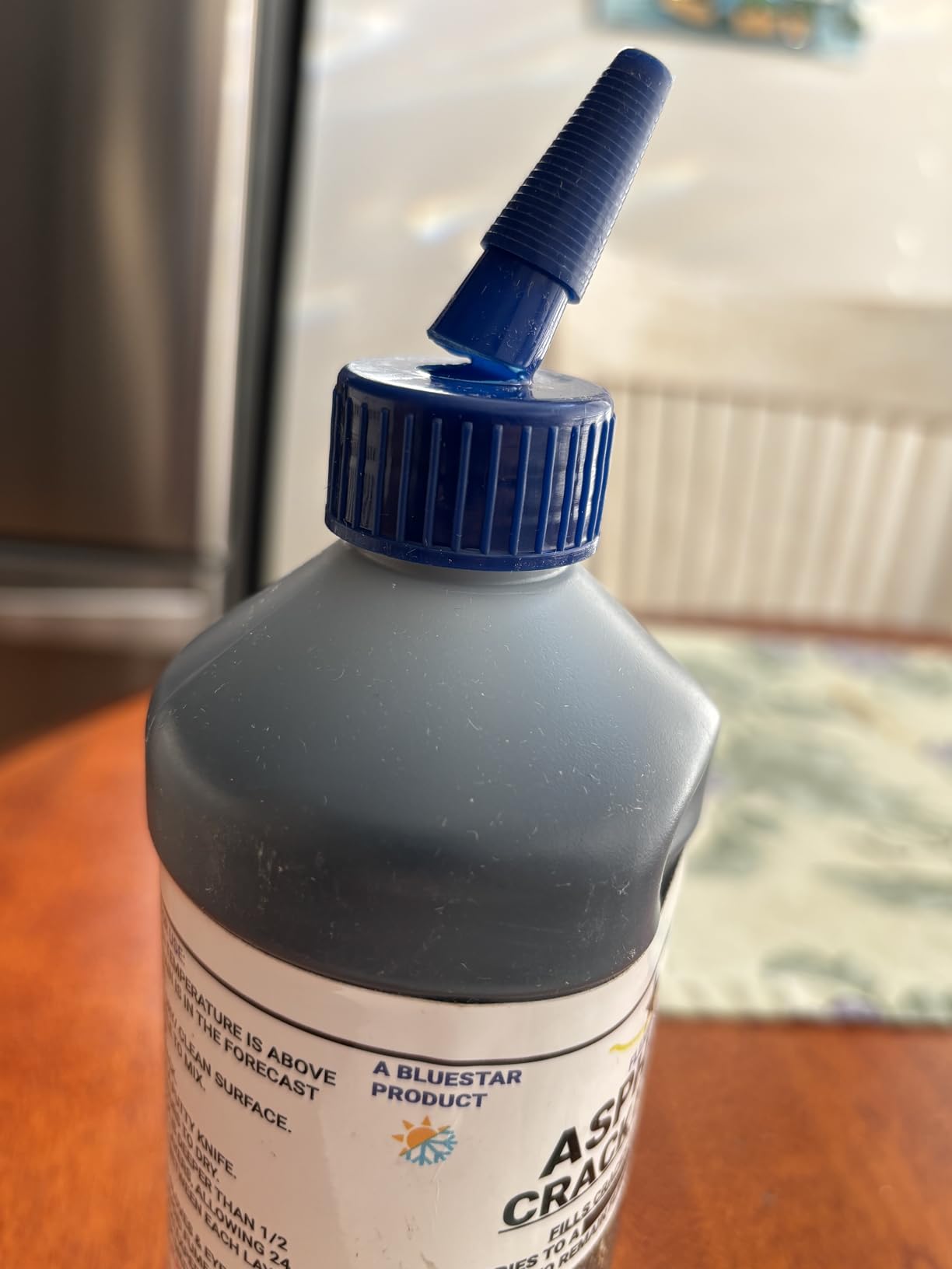 Bluestar Flexible Asphalt Crack Filler, DIY - No Special Tools Needed, Fill Cracks in Asphalt Driveways and Parking Lots. 16 fl. oz. Bottle. customer photo 2