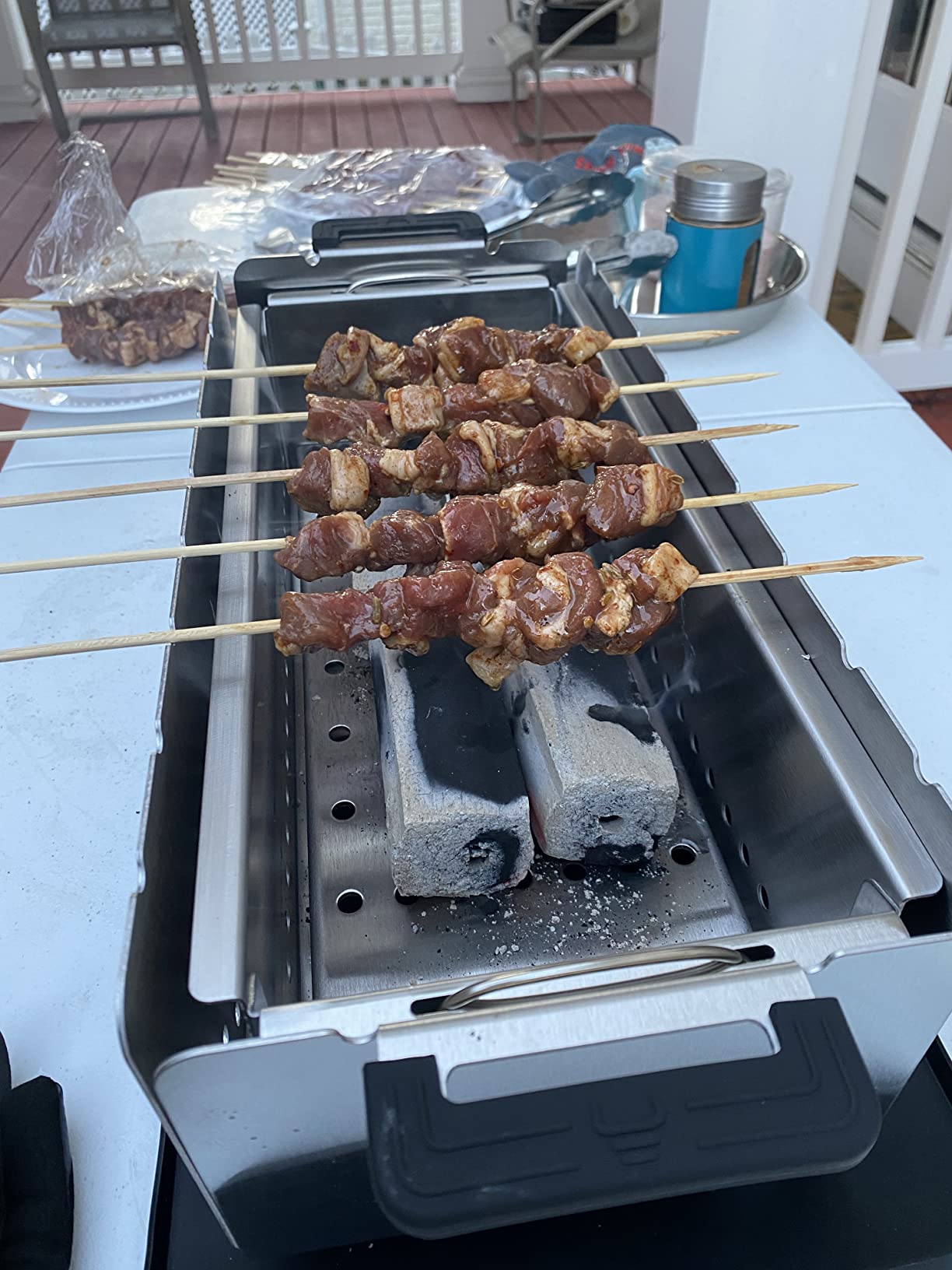 Portable Tabletop Charcoal Grill, YAK Grills Hibachi, 100% Stainless Steel, Grill at 750ºF, Patio, Balcony. 15”x7” Grilling Area. Includes Grate Handle & Carrying Case. customer photo 1