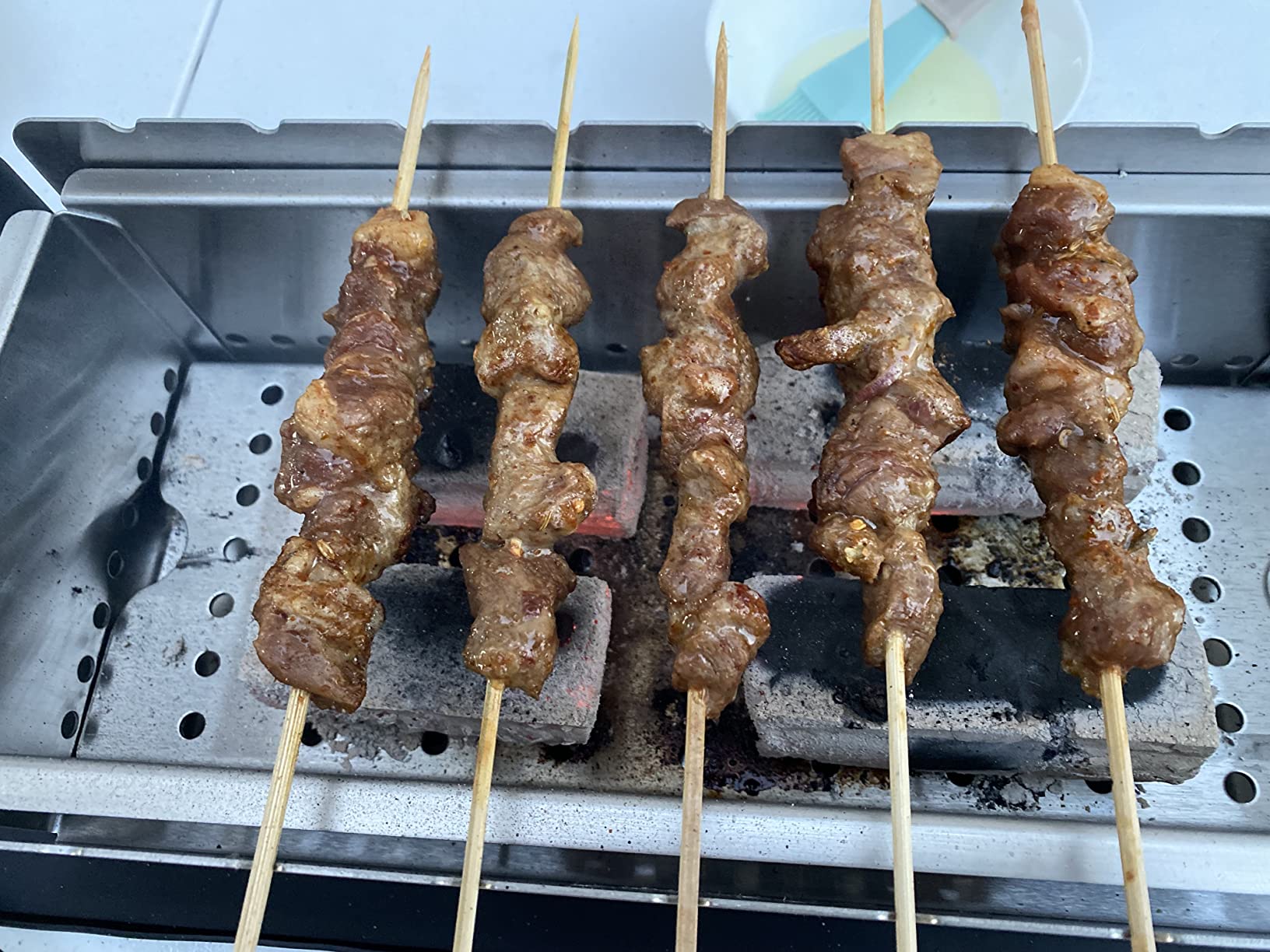 Portable Tabletop Charcoal Grill, YAK Grills Hibachi, 100% Stainless Steel, Grill at 750ºF, Patio, Balcony. 15”x7” Grilling Area. Includes Grate Handle & Carrying Case. customer photo 2