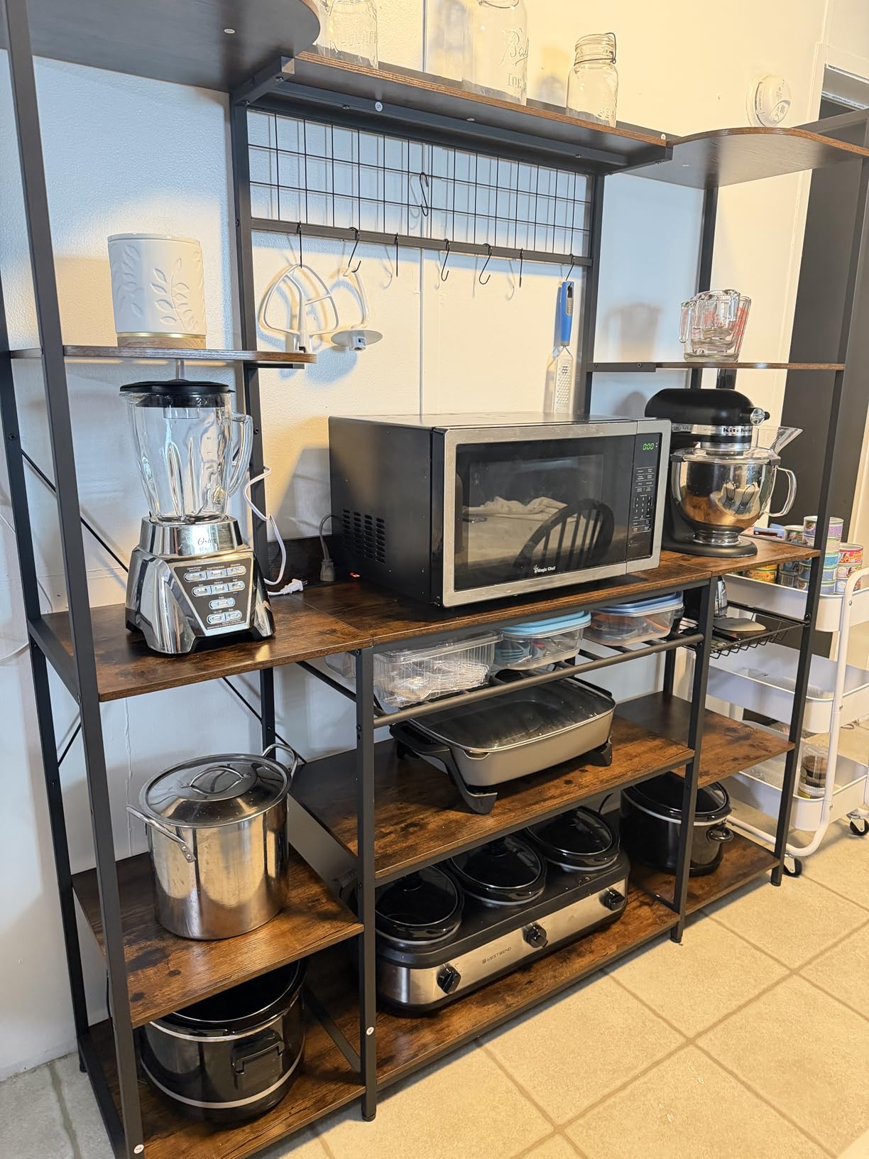 IRONCK 62.4-Inch Bakers Rack with Power Outlets and Wine Storage | 62.4-inch wide bakers rack combines 5 shelves, 3 AC outlets, a wine rack, basket, and S-hooks. customer photo 1
