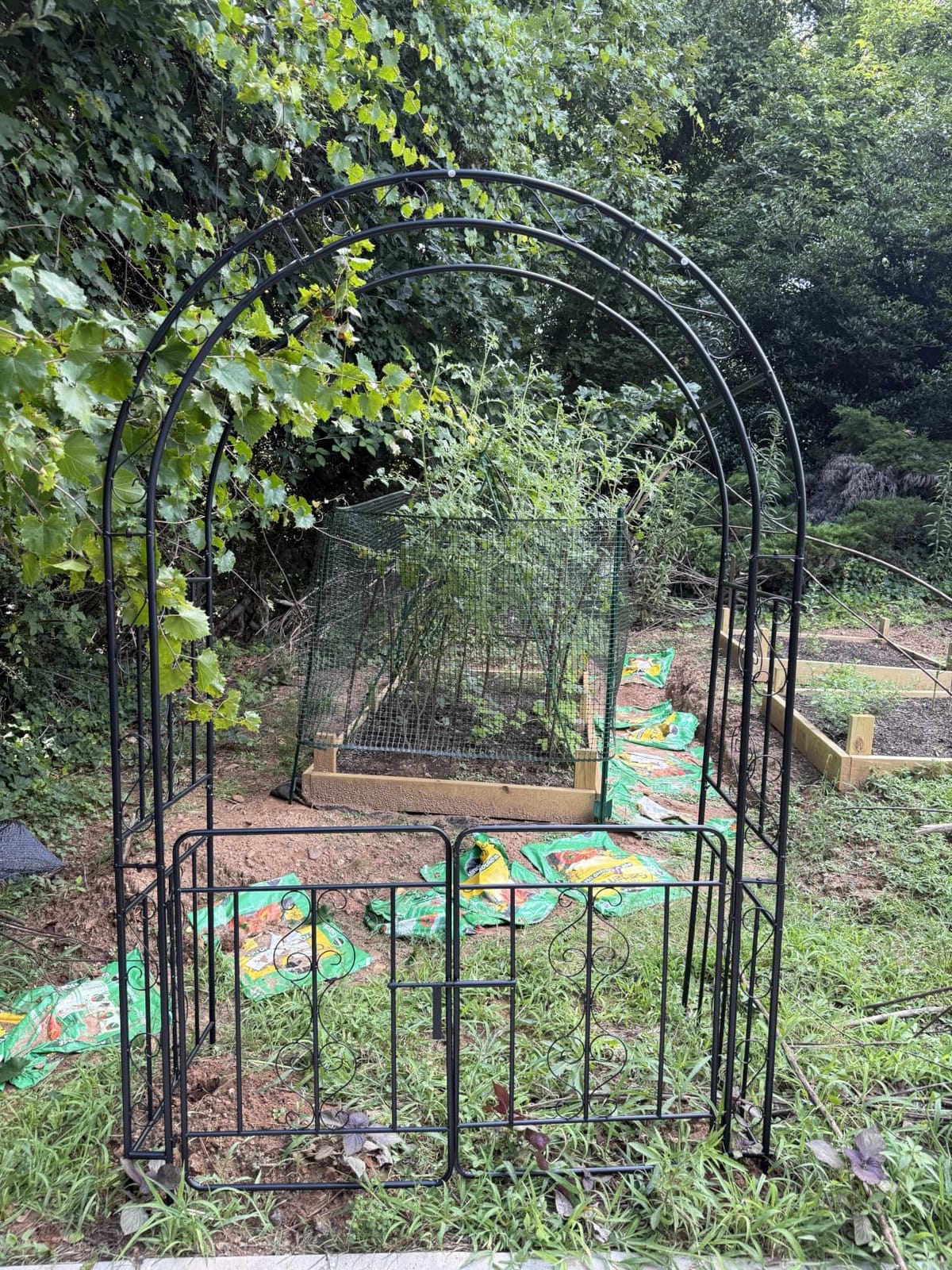 Giantex 84'' Metal Garden Arbor with Gate, Arch Trellis for Climbing Plants customer photo 1