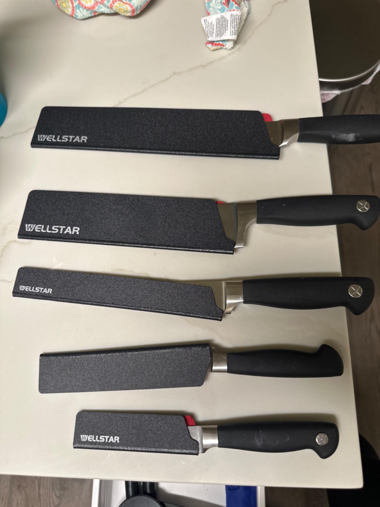 WELLSTAR Knife Edge Guards 8 Inch, Universal Blade Covers, BPA Free ABS Protective Blade Sheaths, Non-Scratch Felt Lining Kitchen Knives Covers (Knives not included) customer photo 1